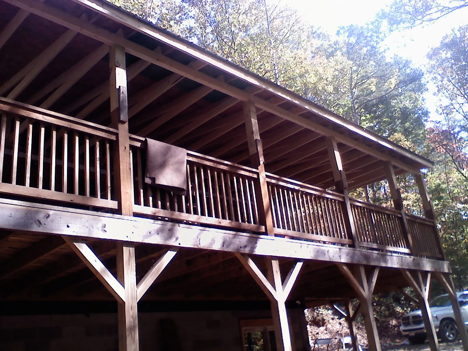 Timber framing under a new elevated porch and deck — Roof Leak Repair in Rainier by Roofing Brothers
